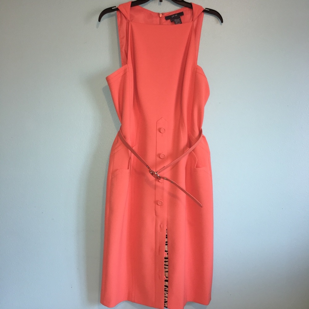 Orange sleeveless dress with belt and pockets